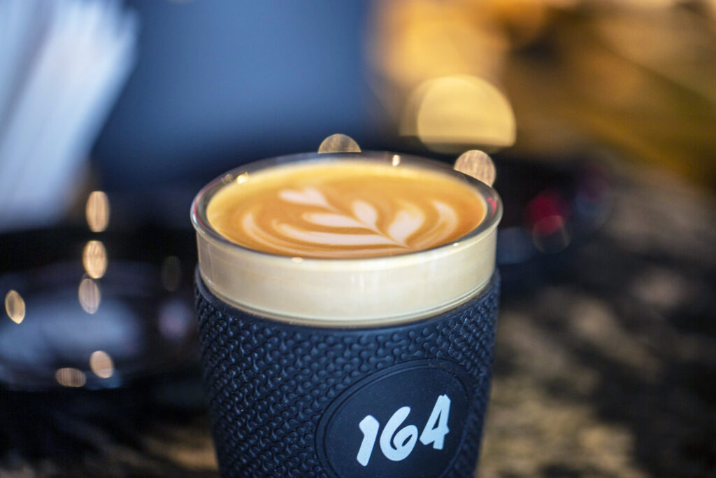 Flat White in a Takeaway Cup at Cafe 164 Leeds
